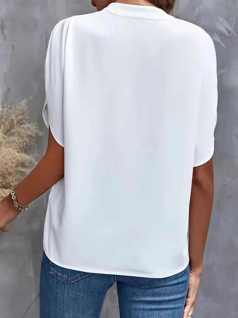 Roswina – Blusa de corte holgado con escote en V